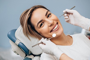 Smiling woman visiting cosmetic dentist in South Portland