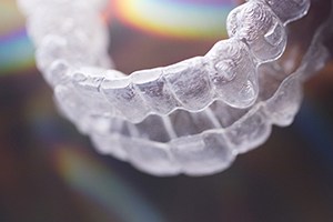 An up-close look at an Invisalign aligner designed to straighten a person’s smile