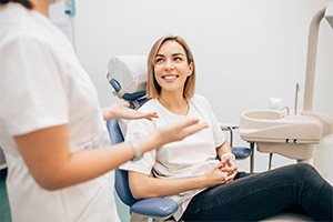 Young patient smiling while visiting dentist