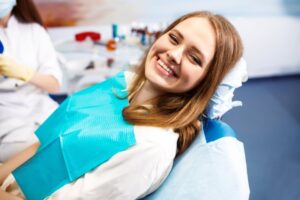 Woman smiling after her root canal